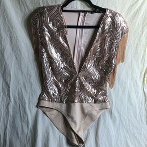 NWT fully sequined body suit. Cream and pink toned